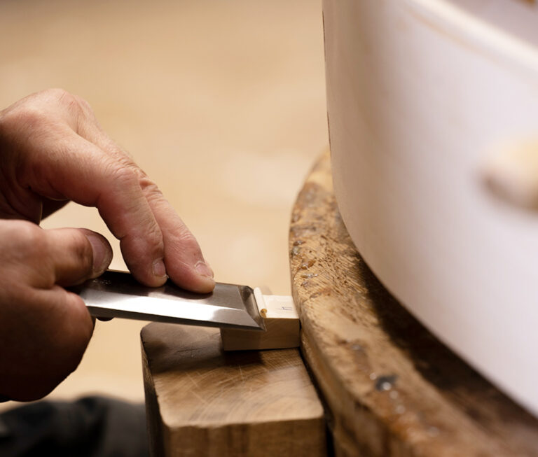 Carpenter Using Chisel